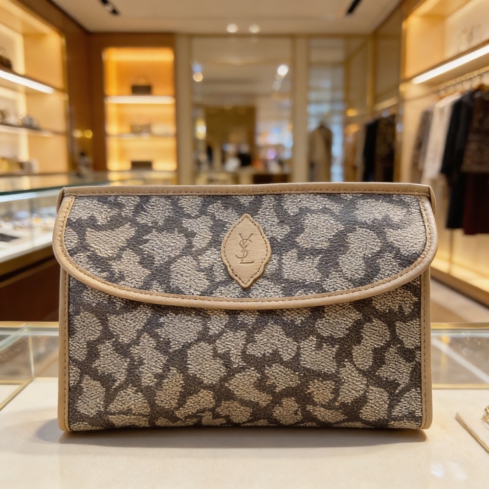 Yves Saint Laurent Giraffe print flap clutch/ like new